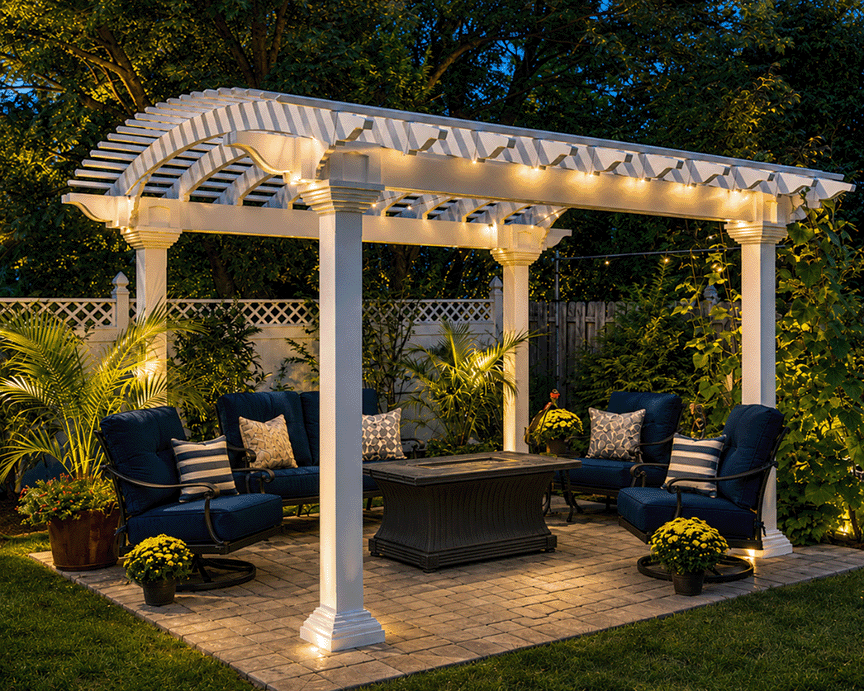 Illuminated pergola and landscaped outdoor seating area